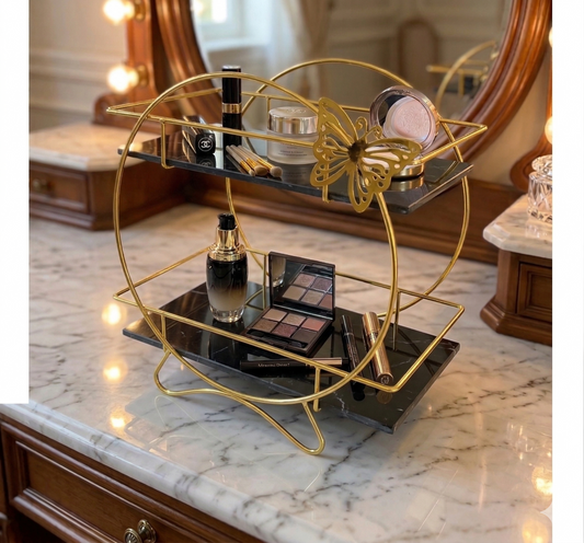 Golden 2-tier butterfly vanity rack with elegant design, ideal for organizing makeup and skincare products.