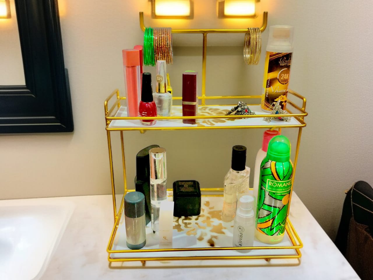 Luxury 2-tier gold makeup organizer and bangle display stand with cosmetic storage shelves by DecoreWholeSale.