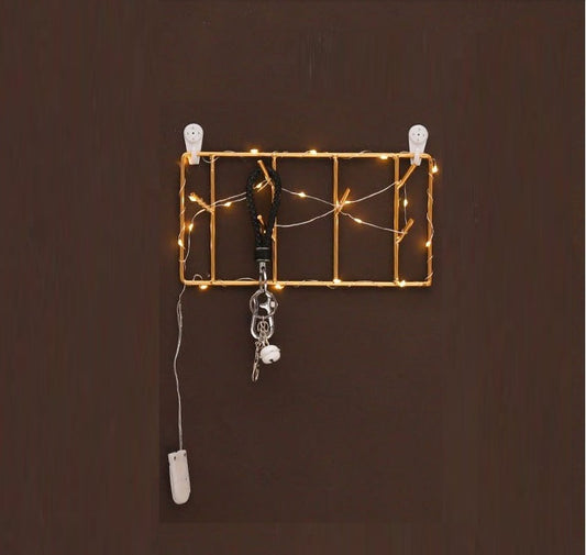 Rectangular and circular gold metal wall hooks for stylish home decor and key storage
