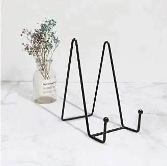 Gold Metal Plate Stand Easel Stand Picture Holder displaying a premium ceramic plate on a wooden table in Pakistan