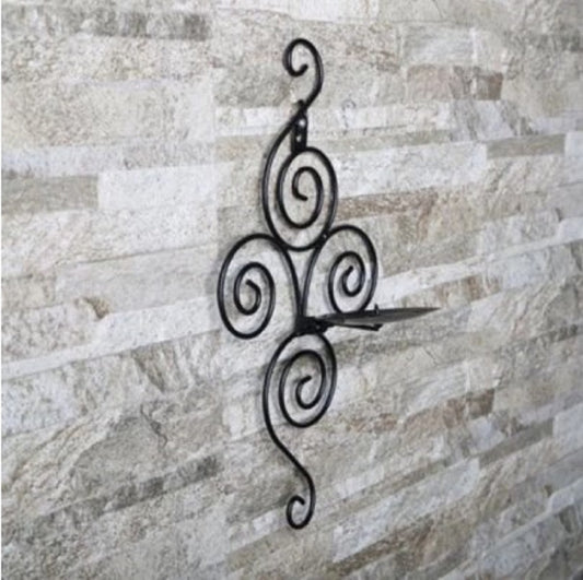 Black curly spiral metal wall sconce with yellow candle - Artistic entryway decoration and mood lighting
