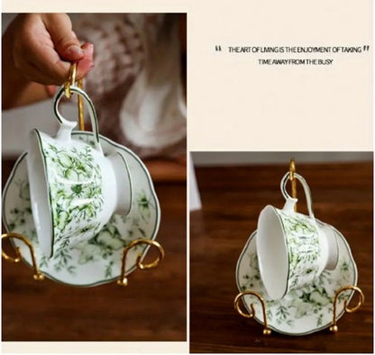 Antique gold Metal Vintage Tea Cup Display Stand holding premium porcelain cups and saucers in a glass cabinet in Pakistan decor wholesale