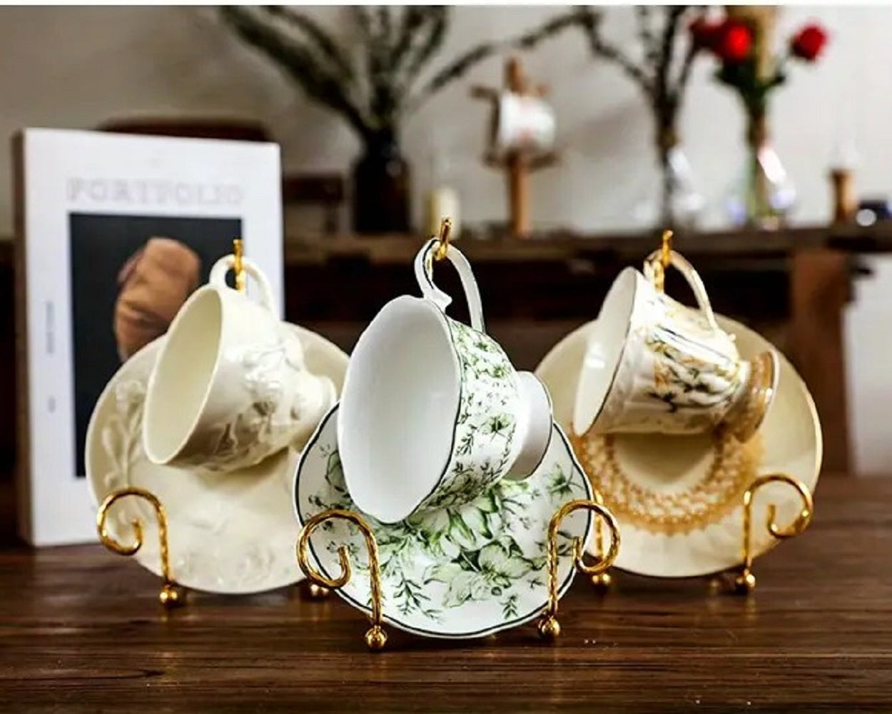 Antique gold Metal Vintage Tea Cup Display Stand holding premium porcelain cups and saucers in a glass cabinet in Pakistan decor wholesale