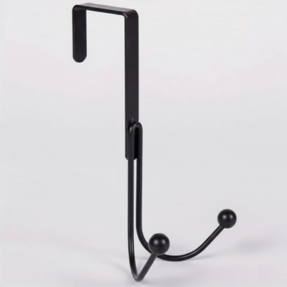 Sleek Metal Over the Door Hook Metal Double Head Hanger holding a backpack and a winter coat behind a bedroom door in Pakistan decore whole sale