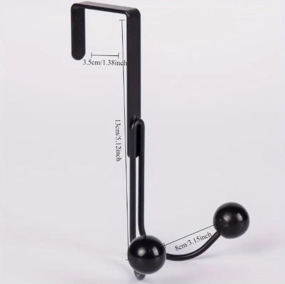 Sleek Metal Over the Door Hook Metal Double Head Hanger holding a backpack and a winter coat behind a bedroom door in Pakistan decore whole sale