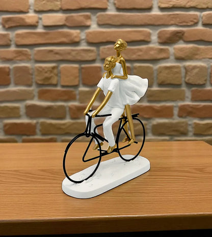Love couple cycle statue

Modern romantic couple figurine

White and golden decoration pieces

Luxury table decor items Pakistan

Bicycle riders love showpiece

Living room console table decor

Wedding anniversary gift items

Nordic style couple sculptures

Imported China home decor pieces

Premium room decoration ornaments
Couple with cycle statue price in Pakistan

Love couple decoration pieces online Pakistan

Buy luxury table showpieces Lahore

Golden and white couple statue price in Karachi

Premium ro