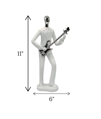 Buy modern white guitar musician statue online

Elegant white and gold guitarist showpiece with price

Premium quality abstract musical figure Pakistan

Unique minimalist instrument player decoration items

High-quality imported China musician statue for room

Buy aesthetic room styling props cash on delivery

Elegant white resin guitar player shelf display

Luxury home lounge decoration centerpieces Pakistan

Beautiful abstract acoustic guitarist ornament

Sleek modern home decor accessories fast shipping