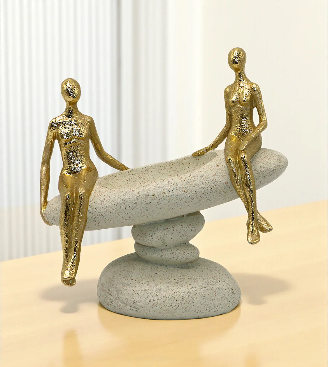 Sitting figure decor Pakistan

China imported accent statues

Table decor Pakistan luxury items

Abstract couple sitting showpiece

Modern romantic home decoration

Living room console centerpieces

Nordic style couple figurines

Imported room decoration ornaments

Premium resin human sculptures

White and gold romantic statues