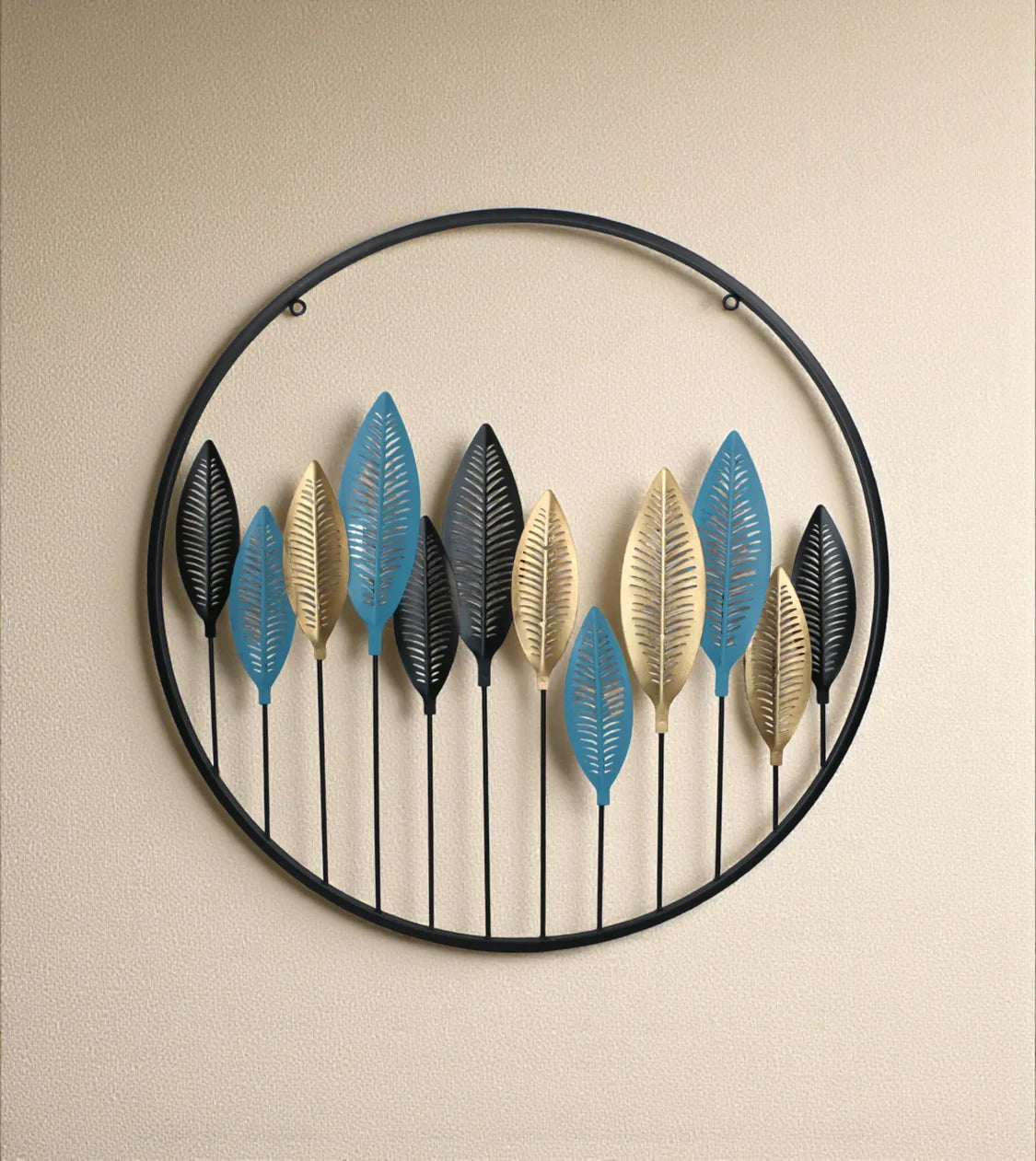 Large Gold Metal Wall Decor Hanging Round Leaves Large imported from China displayed on a luxury drawing room wall in Pakistan