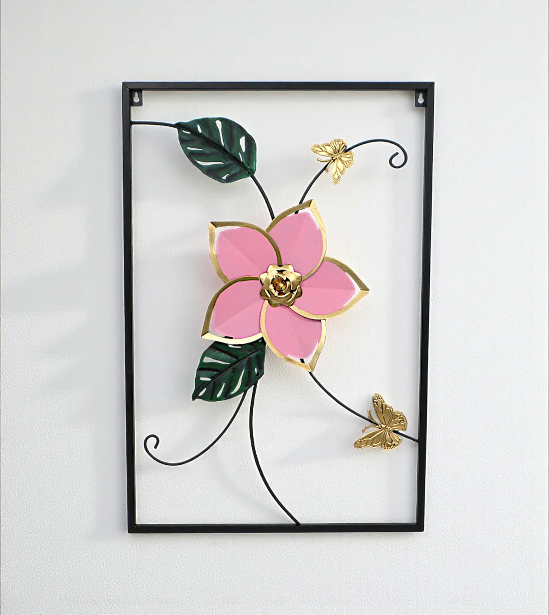 Metal Wall Hanging Floral Rectangle Black used as a premium drawing room wall decor panel above a sofa in Pakistan