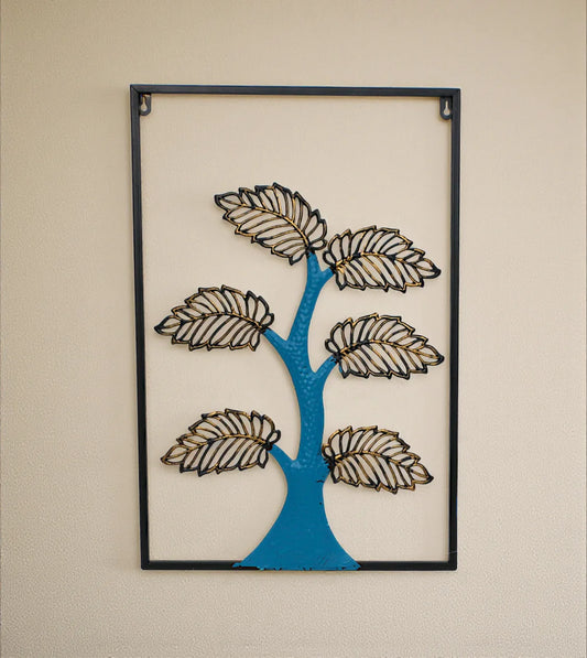 Premium Wall Decore Metal Wall Hanging Floral Rectangle Black with blue tree trunk and gold leaves imported from China on a cream wall in Pakistan