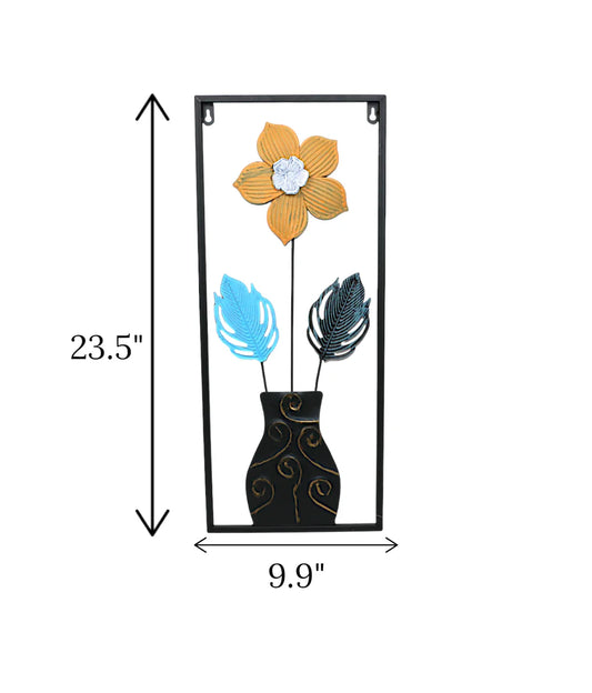 Metal Wall Hanging Floral Rectangle Black with 3D metal monstera leaf wall sculpture displayed on a lounge wall in Pakistan