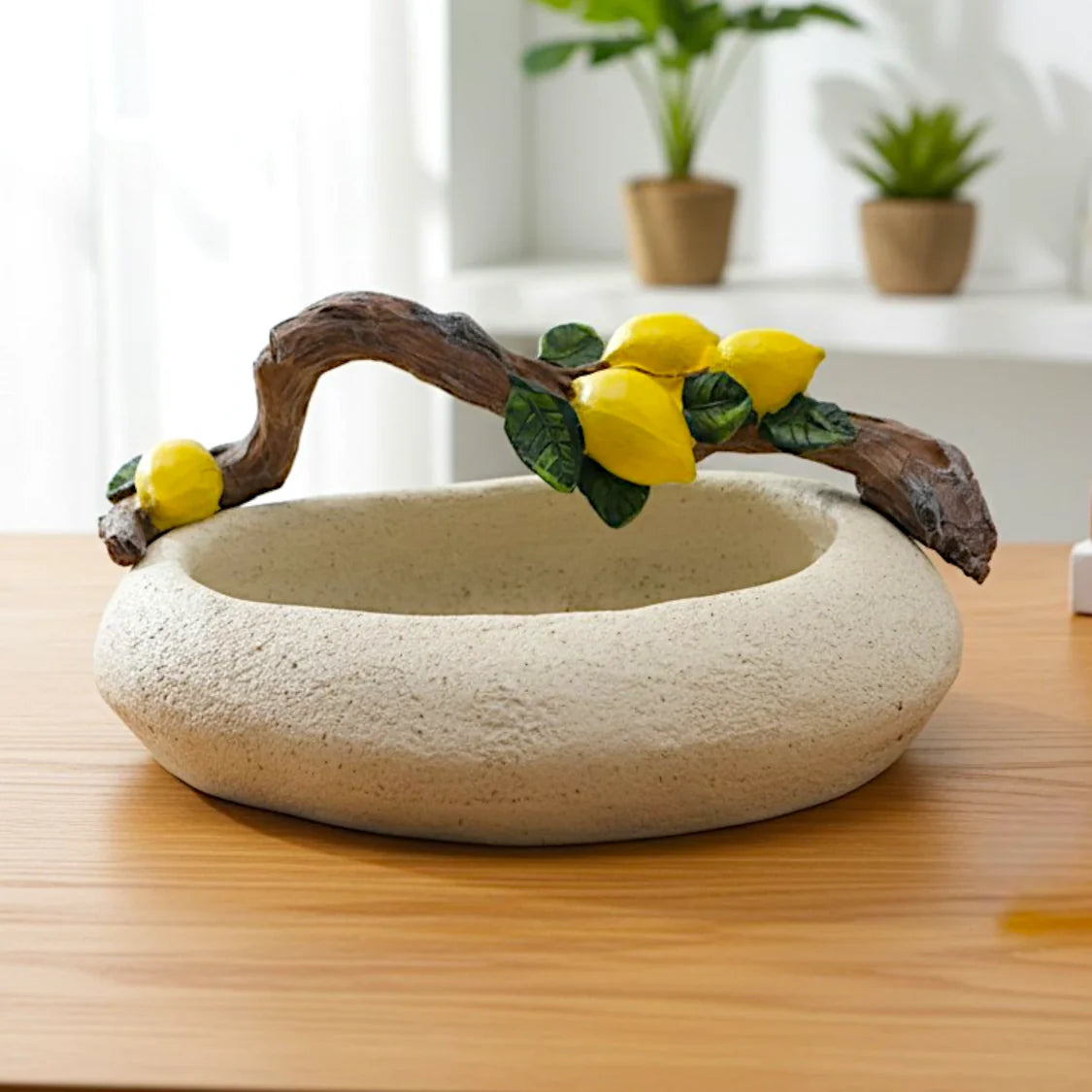 decorative lemon branch bowl resin beige and yellow color 5x7 china Price in Pakistan displayed over a console table