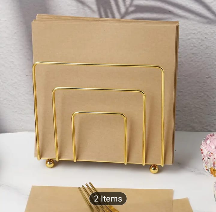 Gold tissue stand, black napkin holder, vertical metal tissue rack, geometric square napkin dispenser, luxury dining table storage, modern kitchen counter organizer, cafe tabletop tissue server, minimalist wire frame napkin cradle, premium restaurant table utilities, wedding catering decorative napkin holder, sleek black iron tissue holder, shiny gold paper napkin rack, upright desk tissue stand, fancy home tea station styling, durable metal wire tableware, luxury dinner party accessories, contemporary tiss