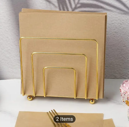 Gold tissue stand, black napkin holder, vertical metal tissue rack, geometric square napkin dispenser, luxury dining table storage, modern kitchen counter organizer, cafe tabletop tissue server, minimalist wire frame napkin cradle, premium restaurant table utilities, wedding catering decorative napkin holder, sleek black iron tissue holder, shiny gold paper napkin rack, upright desk tissue stand, fancy home tea station styling, durable metal wire tableware, luxury dinner party accessories, contemporary tiss