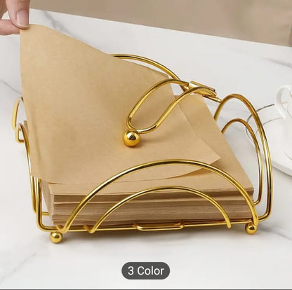Gold tissue holder, metal napkin dispenser, weighted arm tissue rack, tabletop napkin tray, luxury dining table accessories, golden tissue dispenser box, elegant kitchen counter organizer, restaurant table napkin stand, luxury wedding catering decor, modern guest room tissue holder, shiny gold flat napkin tray, wire frame tissue cradle, indoor outdoor party napkins stand, boutique hotel tableware, fancy tissue paper dispenser, desktop stationery sorting tray, premium metal iron napkin basket, decorative gol