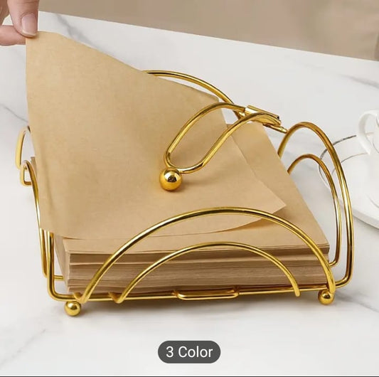 Gold tissue holder, metal napkin dispenser, weighted arm tissue rack, tabletop napkin tray, luxury dining table accessories, golden tissue dispenser box, elegant kitchen counter organizer, restaurant table napkin stand, luxury wedding catering decor, modern guest room tissue holder, shiny gold flat napkin tray, wire frame tissue cradle, indoor outdoor party napkins stand, boutique hotel tableware, fancy tissue paper dispenser, desktop stationery sorting tray, premium metal iron napkin basket, decorative gol