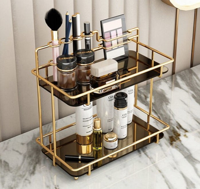 2-Tier Premium Vanity Organizer – Shiny Gold Frame with Integrated Makeup Brush Holder – Luxury Black Marble Base.