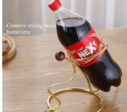 Gold metal Cold Drink Rack Artistic Drink Holder Stand with cold drink bottles on a luxury dining table in Pakistan