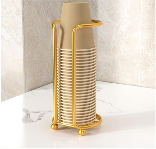 Gold Metal Paper Cup Dispenser Cup Holder standing next to a water dispenser on an office counter in Pakistan