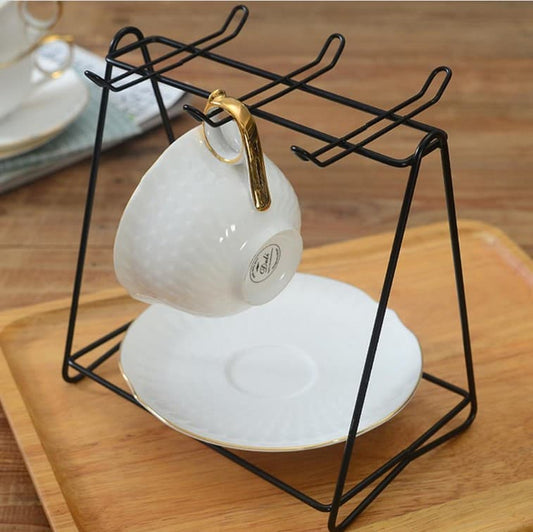 Golden cup stand, luxury tea set rack, square metal mug holder, gold plated saucer rack, kitchen organizer gold, elegant cup hanger, tabletop tea organizer, luxury kitchen decor, 6 hook mug stand, premium dish rack, gold wire tea holder, modern kitchen accessories, bridal gift tea stand, tea party organizer, stylish mug rack, metal cup display, decorative saucer holder, gold finish rack, coffee mug stand, high quality tea organizer.
