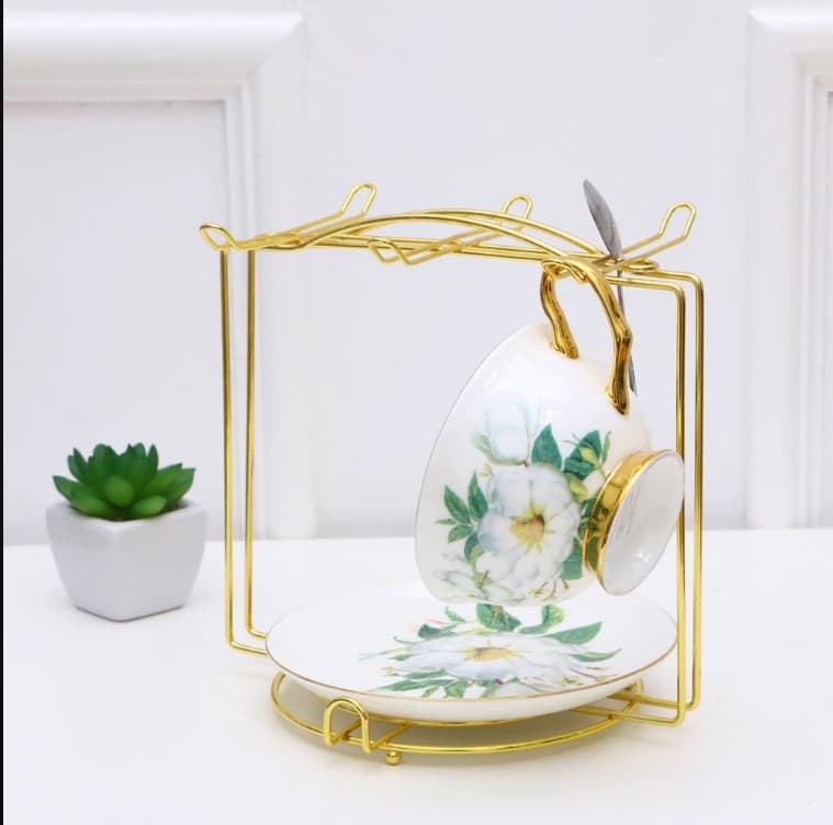 Golden cup stand, luxury tea set rack, square metal mug holder, gold plated saucer rack, kitchen organizer gold, elegant cup hanger, tabletop tea organizer, luxury kitchen decor, 6 hook mug stand, premium dish rack, gold wire tea holder, modern kitchen accessories, bridal gift tea stand, tea party organizer, stylish mug rack, metal cup display, decorative saucer holder, gold finish rack, coffee mug stand, high quality tea organizer.