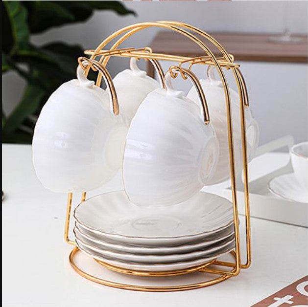 Gold cup stand, luxury tea set organizer, metal mug rack, gold plated cup holder, kitchen saucer rack, elegant tea cup stand, tabletop organizer, decorative kitchen rack, gold wire cup hanger, luxury dining accessories, 6 hook cup stand, space saving kitchen decor, premium quality mug holder, gold finish tea rack, stylish kitchen storage, modern cup organizer, luxury home decor, metallic cup stand, coffee mug holder gold, bridal gift kitchenware.