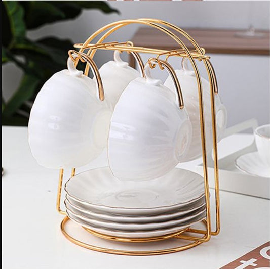 Gold cup stand, luxury tea set organizer, metal mug rack, gold plated cup holder, kitchen saucer rack, elegant tea cup stand, tabletop organizer, decorative kitchen rack, gold wire cup hanger, luxury dining accessories, 6 hook cup stand, space saving kitchen decor, premium quality mug holder, gold finish tea rack, stylish kitchen storage, modern cup organizer, luxury home decor, metallic cup stand, coffee mug holder gold, bridal gift kitchenware.