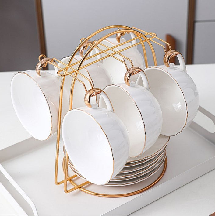 Luxury metal cup and saucer stand with six hooks, perfect for organizing tea sets and food platters in the kitchen.
