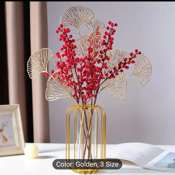 Gold wire vase, cage flower planter, tabletop test tube vase, capsule shape iron wire frame, luxury gold line vase, modern living room centerpiece, elegant desk plant holder, shiny gold hydroponic vase, luxury dining table decor pakistan, geometric iron vase structure, creative wire vase centerpiece, small indoor flower container, boutique cafe table styling props, faux red berries display stand, golden ginkgo leaf vase, aesthetic metal line planter, apartment room decoration accessories, high end office de
