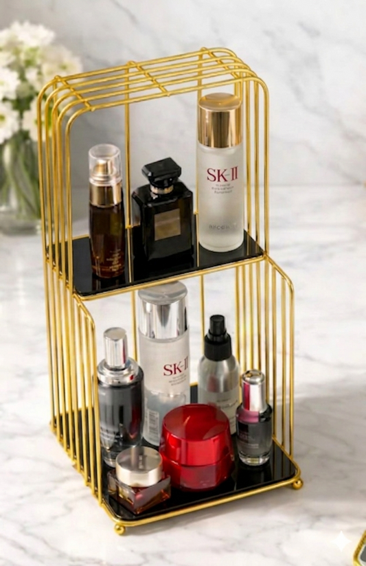 Gold metal Style Makeup Vanity Shelf holding cosmetics and luxury perfume bottles on a modern dressing table in Pakistan