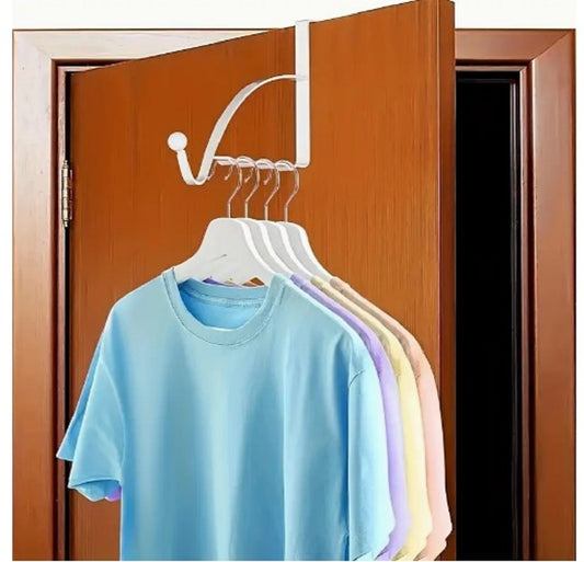 Black metal Over-the-Door Coat Rack with non-slip hooks hanging jackets and bags behind a bedroom door in Pakistan