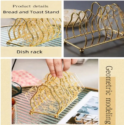 Luxury Gold Metal Plate Coaster Stand holding acrylic gold-flake coasters on a glass dining table in Pakistan