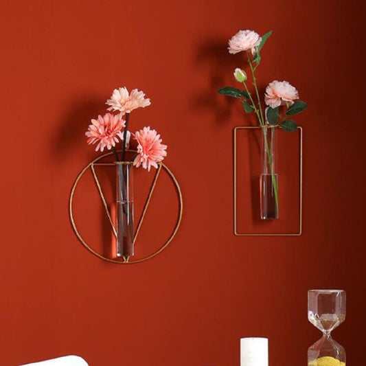 Modern circular gold metal wall vase with glass tube and pink flowers - Aesthetic wall decor Pakistan