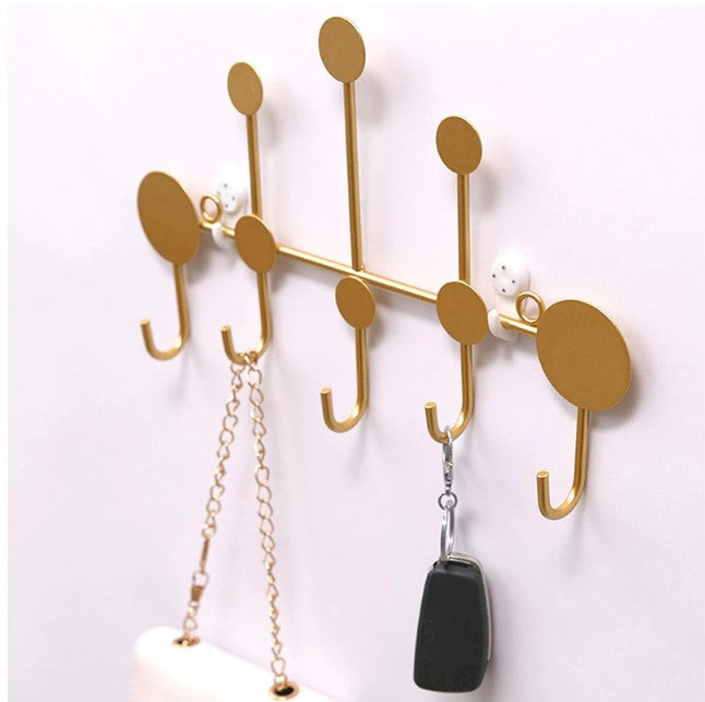 Luxury abstract dot design gold metal wall hook for coats, keys, and hats - Nordic style home decor Pakistan.