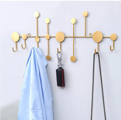 Luxury abstract dot design gold metal wall hook for coats, keys, and hats - Nordic style home decor Pakistan.
