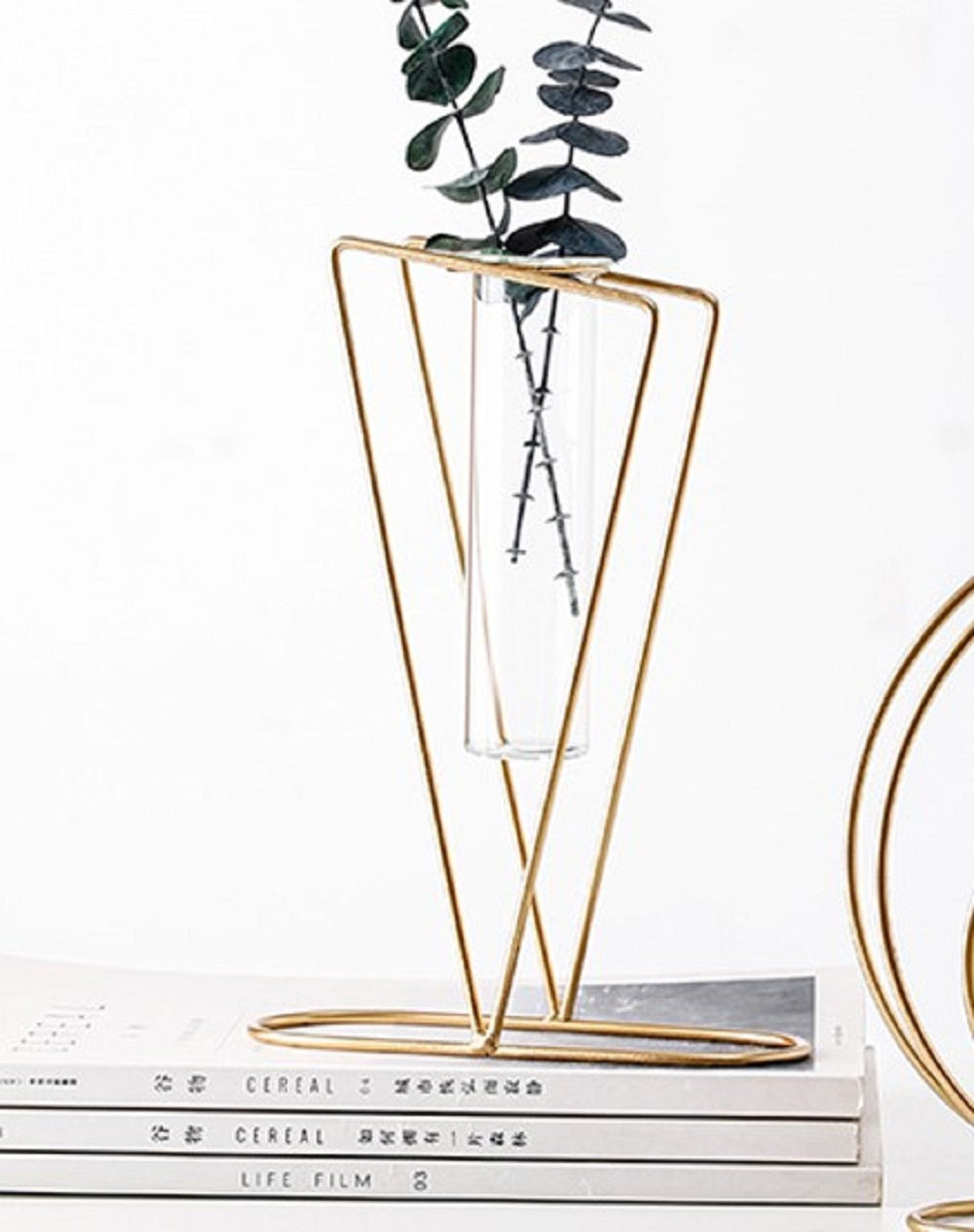 Elegant gold metal frame hydroponic vase with two glass bottles and pink flowers - Luxury home decor Pakistan