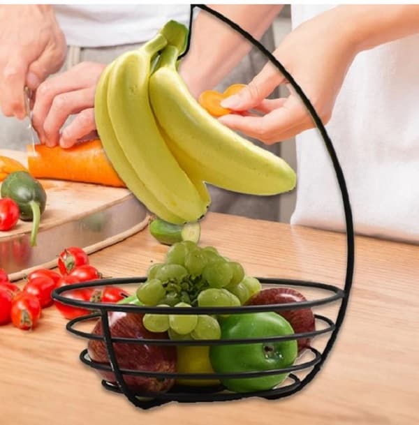 Fruit basket with banana hanger, kitchen countertop organizer, metal fruit bowl, banana tree stand, vegetable storage basket, black wire fruit holder, kitchen space saver, modern dining table decor, fresh produce basket, banana hook stand, durable metal basket, kitchen accessory organizer, wire mesh fruit bowl, fruit display stand, minimalist kitchen storage, rust resistant fruit rack, banana hanger bowl, kitchen organization ideas, tabletop fruit holder, fruit basket for home