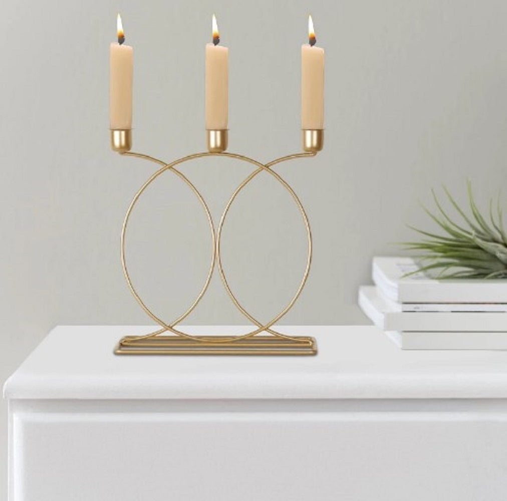 Taper candlestick holder

Glossy gold plated finish

3-arm and 5-arm candelabra

Event management decor accessories

Floral arrangement table stand

Hanging crystal drops design

Vintage style brass candle stand

Premium iron metal structure

Dinner table centerpiece layout

Shadi event entrance decoration