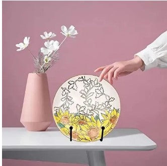 Gold Metal Plate Stand Easel Stand Picture Holder displaying a premium ceramic plate on a wooden table in Pakistan