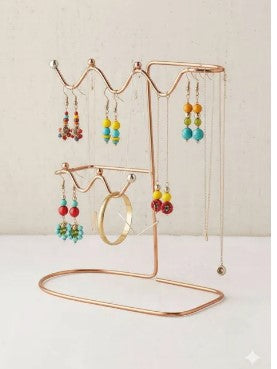 Elegant metal jewelry organizer stand for earrings and necklaces, ideal for vanity tables, by Decore Whole Sale.