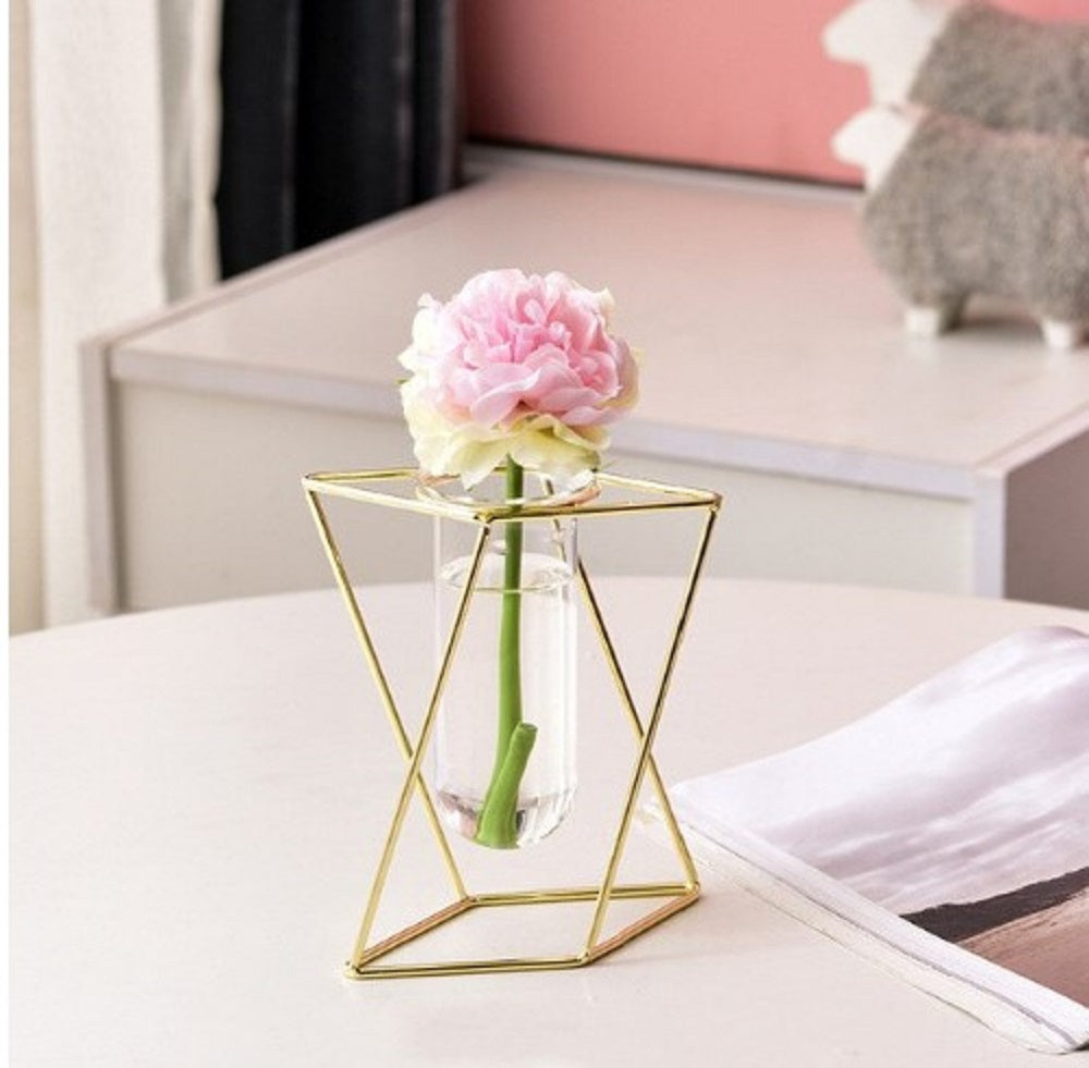 Inverted triangle gold vase, geometric plant holder, hydroponic flower vase, glass tube decor, metal frame stand, modern home accessories, indoor flower pot, gold plated decoration, tabletop vase, luxury home decor, minimalist plant holder, abstract metal stand, glass test tube holder, office desk accessory, stylish flower vase, nordic style decor, home styling plant holder, decorative gold vase, propagation station, elegant flower stand.