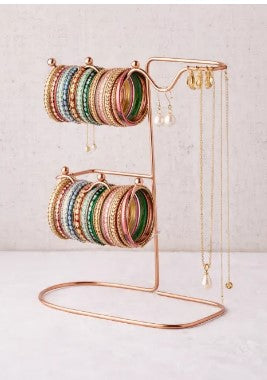 Elegant Decore Whole Sale jewelry organizer stand with metal earrings and necklace display rack on vanity table.