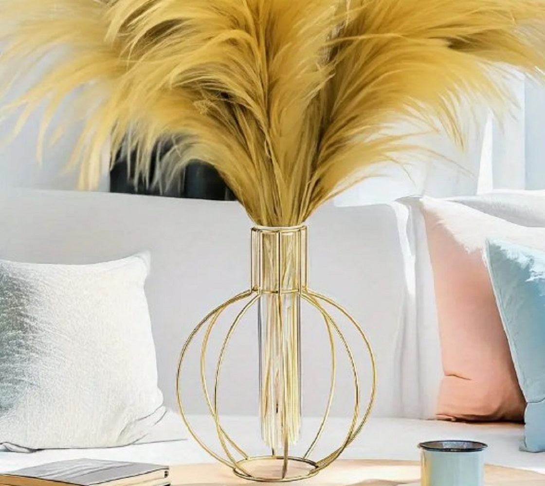 Gold round wire vase, globe shape flower planter, tabletop test tube vase, spherical iron wire frame, luxury gold line vase, modern living room centerpiece, elegant desk plant holder, shiny gold hydroponic vase, luxury dining table decor pakistan, geometric iron vase structure, creative wire vase centerpiece, small indoor flower container, boutique cafe table styling props, faux pampas grass display stand, golden feather leaf vase, aesthetic metal line planter, apartment room decoration accessories, high en