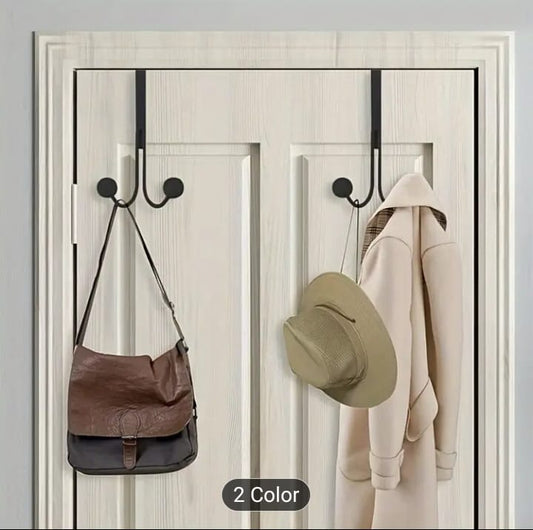 Sleek Metal Over the Door Hook Metal Double Head Hanger holding a backpack and a winter coat behind a bedroom door in Pakistan decore whole sale 