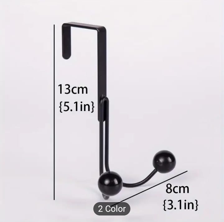 Sleek Metal Over the Door Hook Metal Double Head Hanger holding a backpack and a winter coat behind a bedroom door in Pakistan decore whole sale