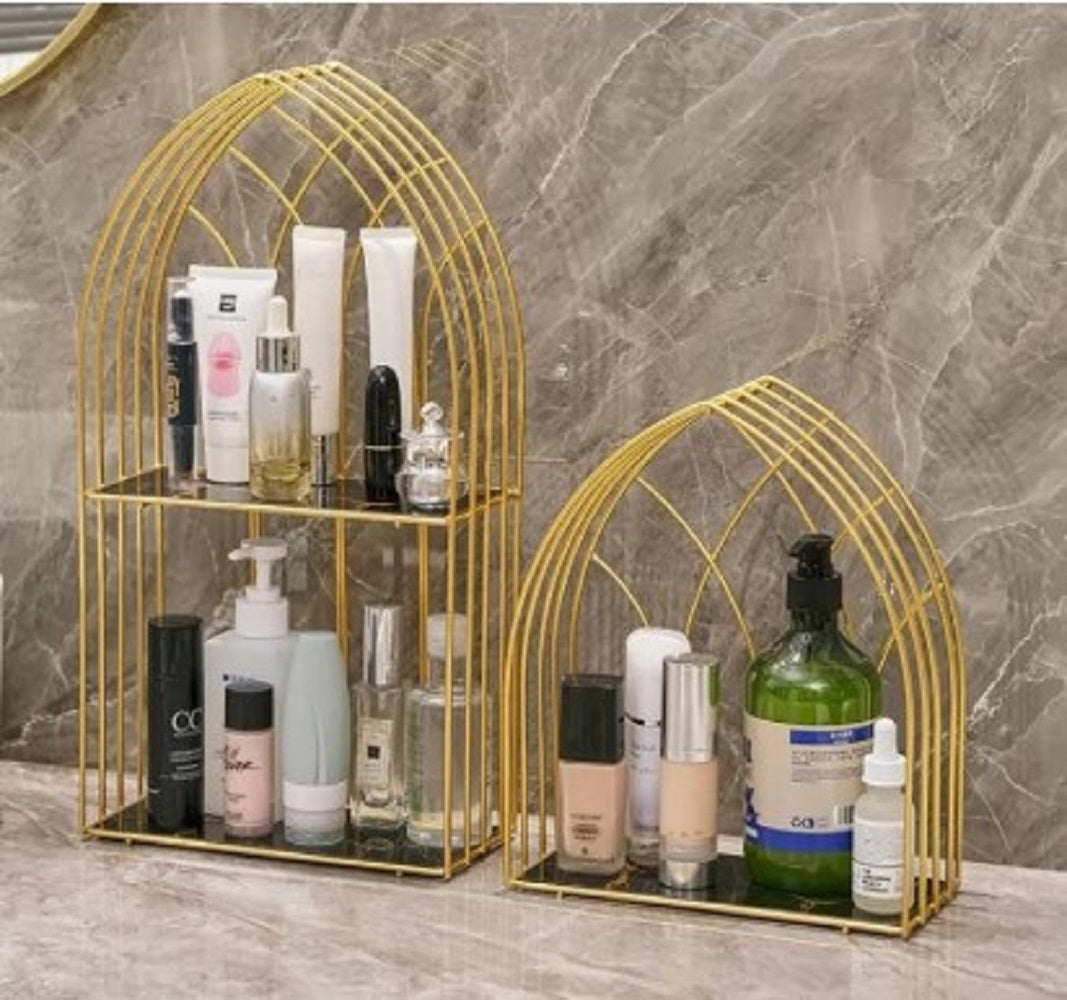 Luxury gold birdcage makeup organizer and perfume display rack for dressing table vanity.